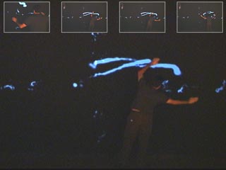 visitor creating light traces with body motion